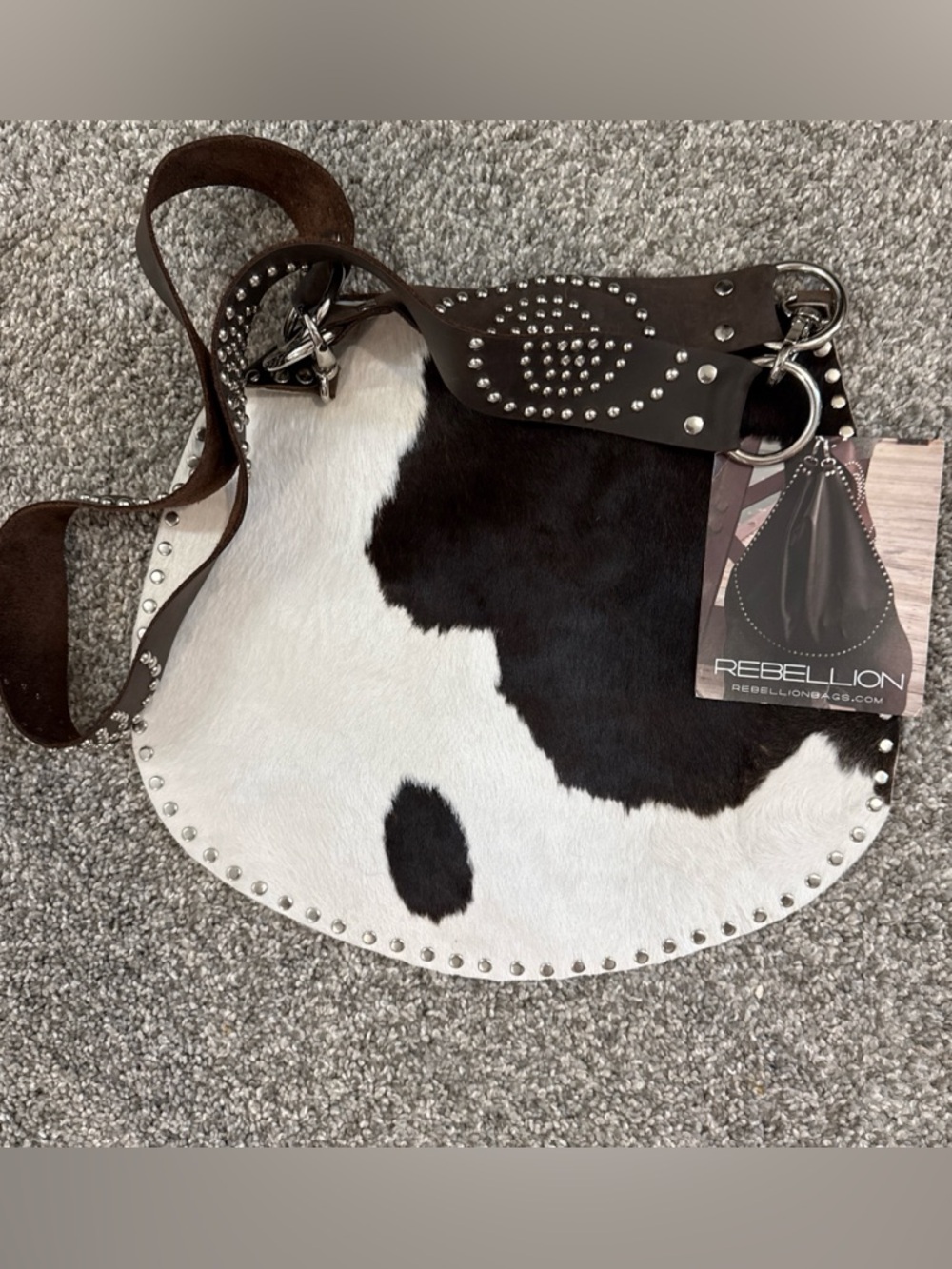 Rebellion Black and White Cowhide Studded Saddle Bag